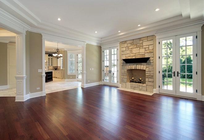 elegant walnut wood flooring being laid in a new build